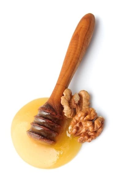 Premium Photo Honey Dipper With Walnuts