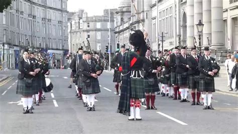 A Scottish Pipe Band Marching In Aberdeen Youtube