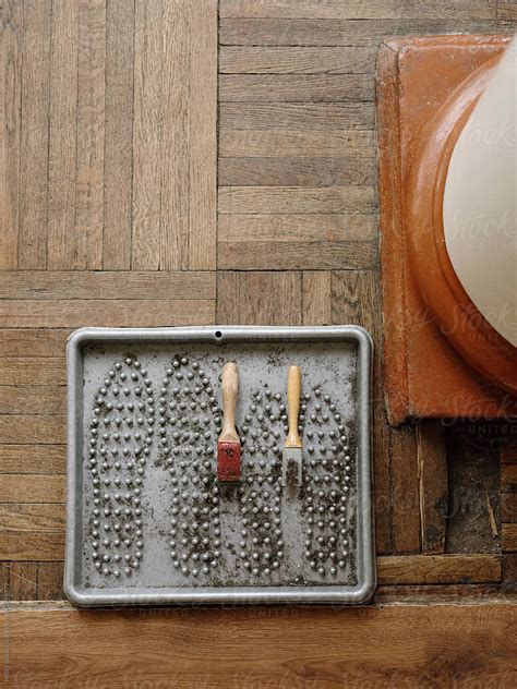 Box With Shoe Brushes On Floor By Stocksy Contributor Milles Studio