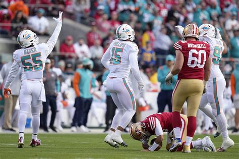 Jimmy Garoppolo carted off with injury in 49ers vs. Dolphins