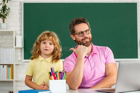 Father Or Teacher Hold Big Stack School Textbook Notebook Books Back