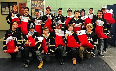 Aurora Minor Hockey Tigers roar together to help community with over ...