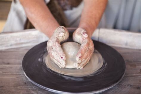 Potter S Wheel With Clay Women S Hands Make A Vase Of Clay Stock Image