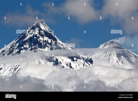 Beautiful Volcanic Landscape View On Kamen Volcano And Active Klyuchevskoy Volcano Above The