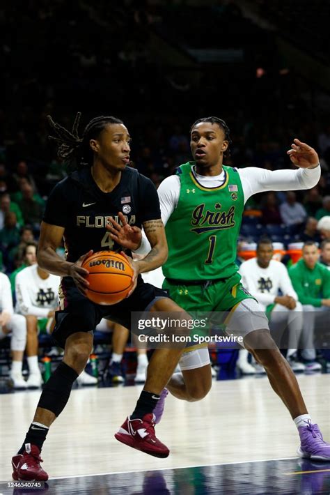 Florida State Seminoles Guard Caleb Mills Tries To Drive Around Notre