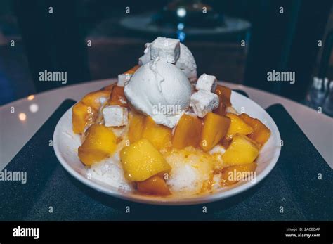 Close Up View Of Freshly Made Bowl Of Mango Bingsoo Korean Shaved Ice