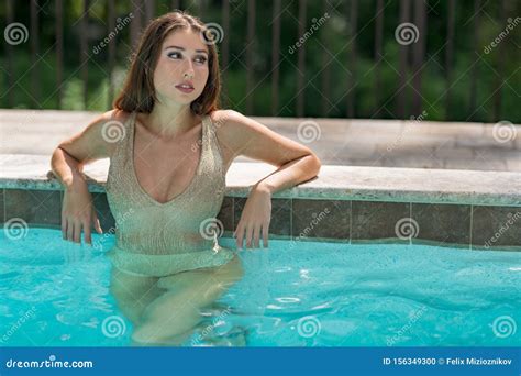 Bikini Model Posing By The Pool Stock Photo Image Of Blurry Gold