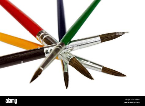 Artistic Colored Paint Brushes Isolated On White Background Stock Photo