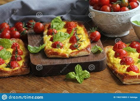 Fresh Tomato Tart Puff Pastry Topped With Ricotta Cheese And Cherry