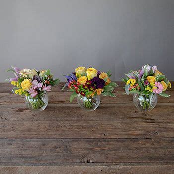 Our Rainbow Themed Flower Arrangements enhance the whimsical side of ...