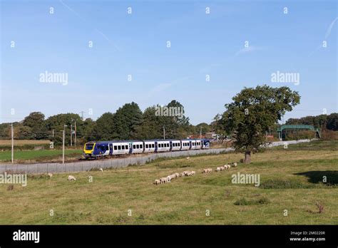 Northern Rail Caf Class 195 Diesel Multiple Unit Train 195111 On The West Coast Mainline In The