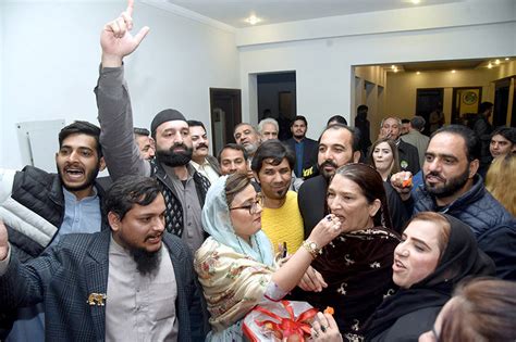 PML N Workers Distribute Sweets Among The Supporters To Celebrate The