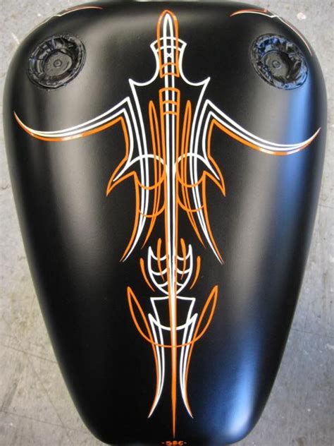 Pinstripe Orange And White On A Black Motorcycle Tank Pinstripe Art