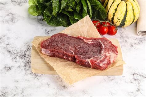 Premium Photo Raw Rib Eye Beef Premium Steak