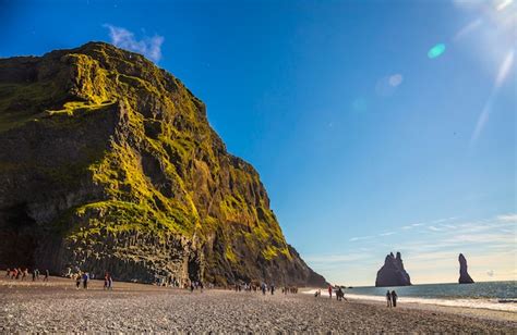 Premium Photo | Sunrise at the famous reynisdrangar beach in the golden ...