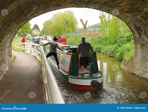 Narrowboat Passing Under Canal Bridge Editorial Stock Image Image Of