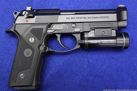 Beretta Usa Model Fs Vertec Pistol With A Trl Streamlight Mm