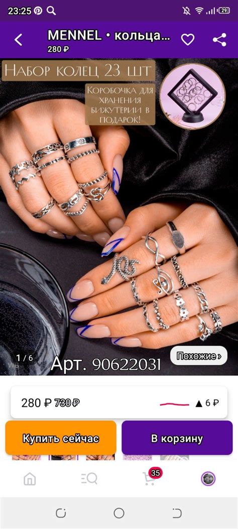 A Woman S Hand With Many Rings On It And An Ad For The Website