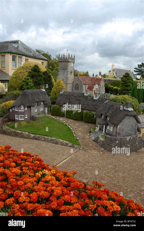 The Model Village Of Godshill With Its Famous Thatched Roof Cotages And