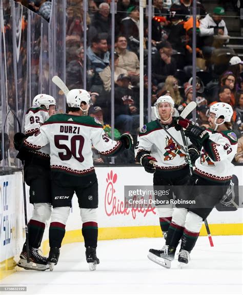 Logan Cooley Of The Arizona Coyotes Celebrates His Goal With News