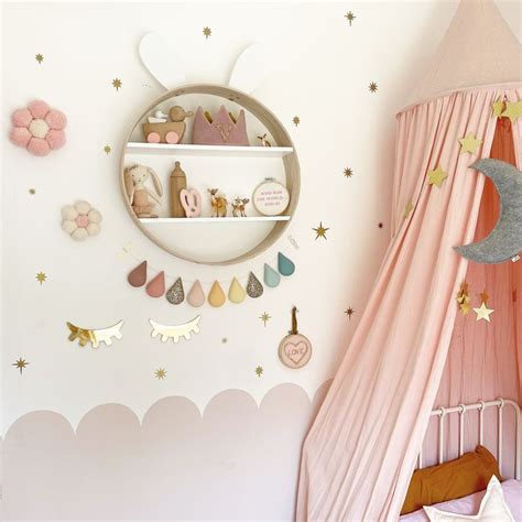 Pretty Girls Room Decor Featuring A Pink Bed Canopy Gold Star Wall