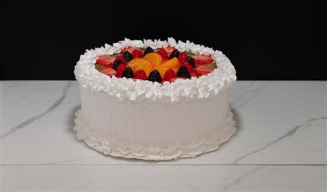 Large Vanilla Frosted Cake With Fruit Just Dough It