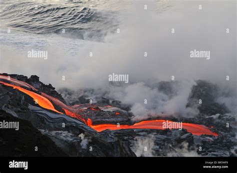 River Of Molten Lava Flowing To The Sea Kilauea Volcano Hawaii