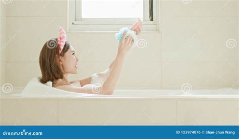 Woman Wash Body In Bathtub Stock Photo Image Of Bathtub 123974076