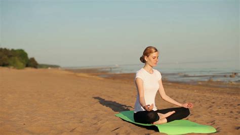 Woman Practices Yoga On Beach Stock Footage Sbv 308525072 Storyblocks