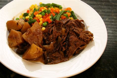 Oven Braised Pot Roast With Garlic Thyme And Red Wine Recipe Pot Roast Pot Roast Slow