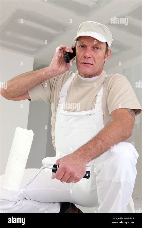 Painter Making Telephone Call Stock Photo Alamy