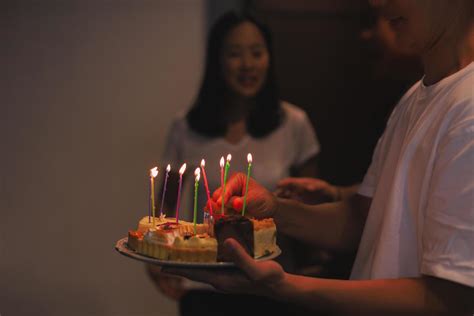 Man holding birthday cake with candles for birthday girl in the house. 7311897 Stock Photo at ...