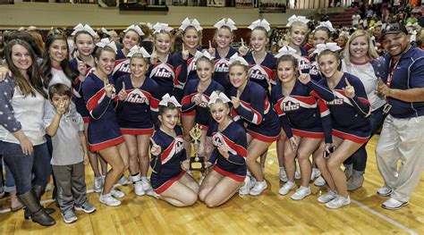 Competition cheerleading: Heritage wins 7AAAA | Cheerleading ...