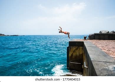 42 Young Man Enjoying His Vacation Jumping Having Fun Beach Images ...