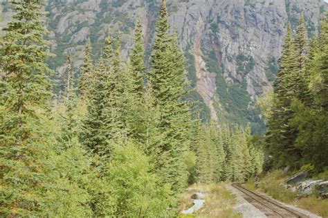 Train Tracks Running Through A Mountain Range Stock Photo Image Of