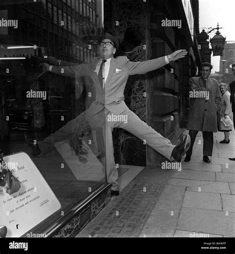 Harry Worth Comedy Actor October 1962 with his refection in a window Stock Photo - Alamy