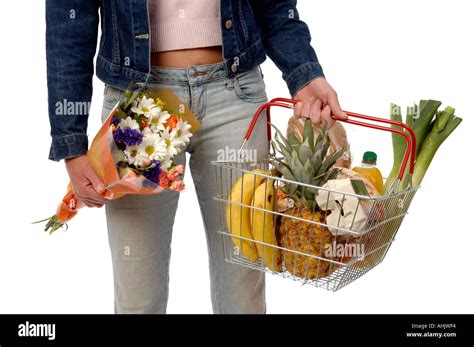 Holding Shopping Basket Hi Res Stock Photography And Images Alamy