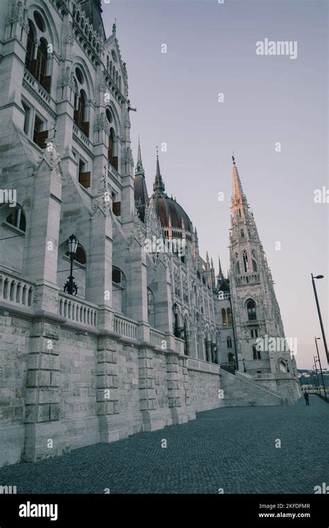 A Vertical Low Angle Grayscale Shot Of The Hungarian Parliament