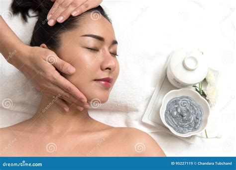 Woman Lying And Preparation Face Or Head Massage In Spa Stock Image