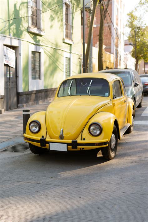 Photo of a Yellow Volkswagen Beetle · Free Stock Photo