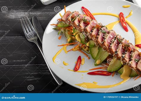 Japanese Food Tataki With Tuna Fried Fish With Sesame Seeds And Soy