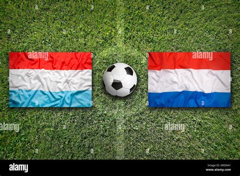 Luxembourg Vs Netherlands Flags On Soccer Field Stock Photo Alamy