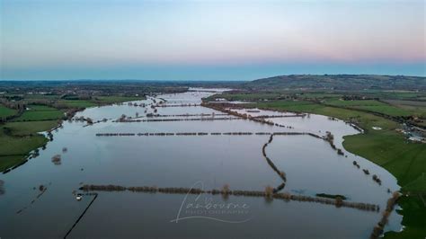 Sun sets on Tewkesbury flooding in stunning drone photographs ...