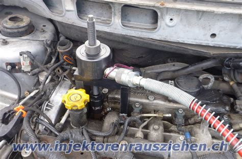 Injektoren rausziehen Einspritzdüsen ausbauen aus Dieselmotoren mit