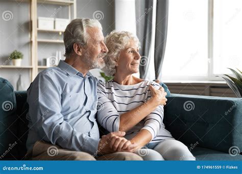 Smiling Old Couple Hug Look In Distance Dreaming Stock Image Image Of