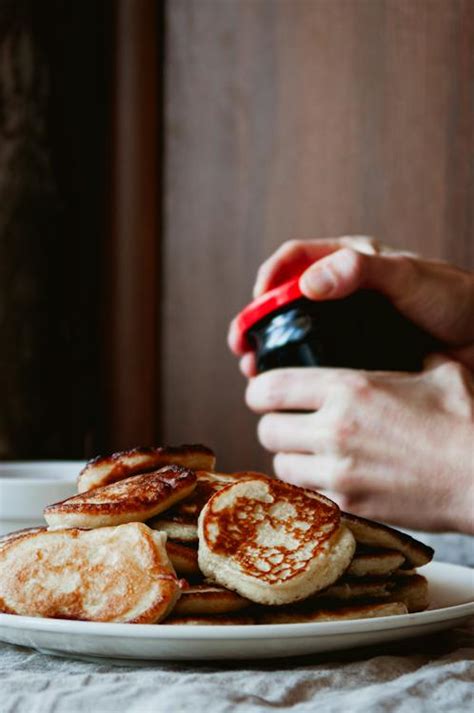 Person with Jar of Jam by Pile of Homemade Racuchy Pancakes · Free ...