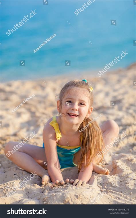 Little Girl Playing On Sand Beach Stock Photo 135048275 Shutterstock