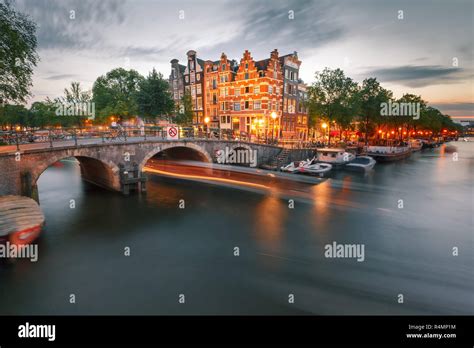 Night City View Of Amsterdam Canal And Bridge Stock Photo Alamy