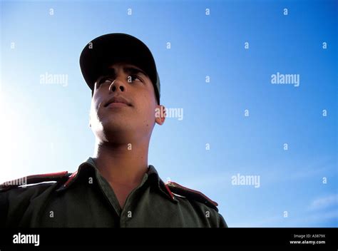 A Cuban soldier dressed in uniform stands guard at La Cabana Stock ...