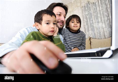 Childhood, laptop, learning and playing Stock Photo - Alamy